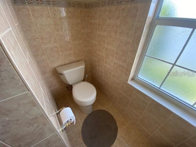 30 San Rafael Court Palm Coast, FL 32137 - Photo 20 of 32 a bathroom with a toilet and a sink