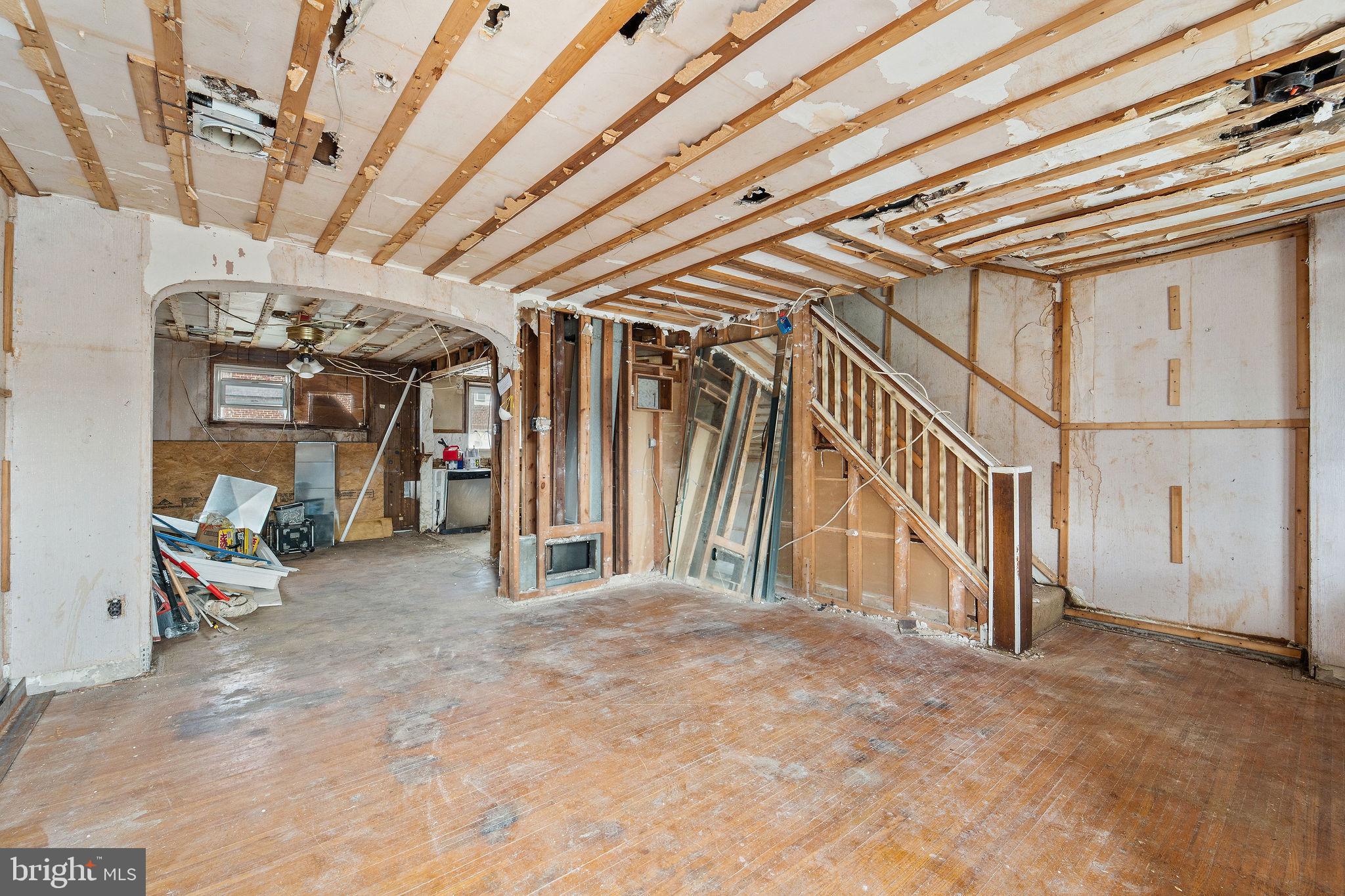 642 Randolph Street Camden, NJ 08105 - Photo 5 of 24 a view of a hallway with stairs