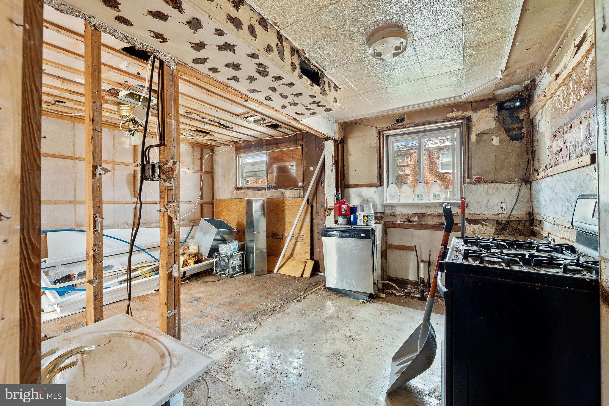 642 Randolph Street Camden, NJ 08105 - Photo 9 of 24 a kitchen that has a lot of cabinets in it