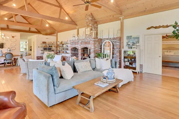 a bedroom with a bed and ceiling fan