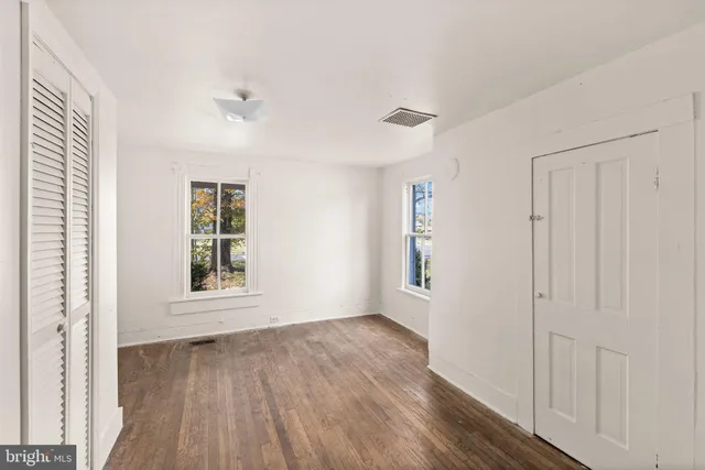 an empty room with windows