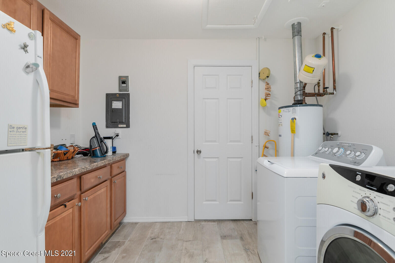 865 Osage Avenue Melbourne, FL 32935 - Photo 21 of 38 a room with storage and utility