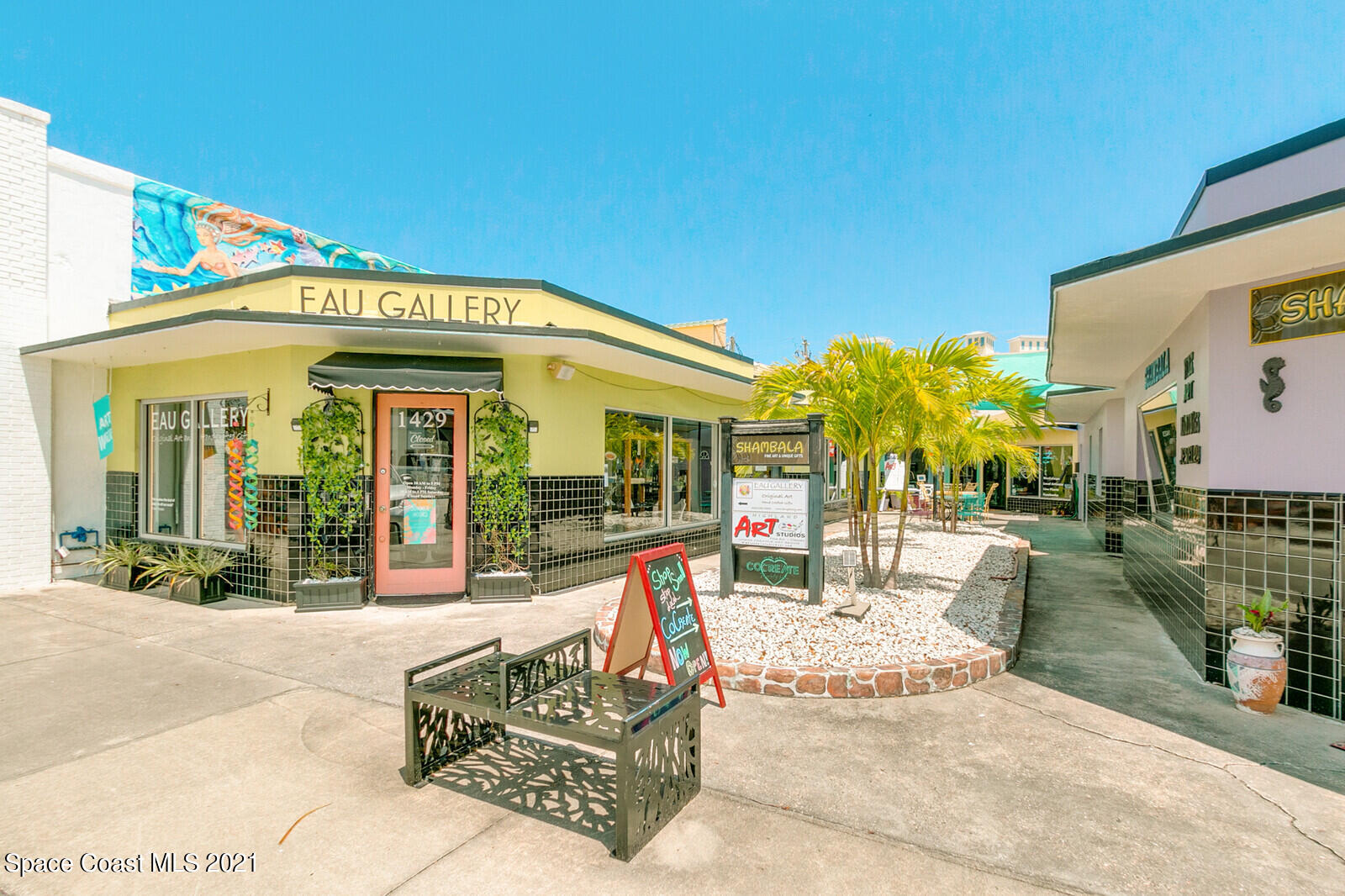 865 Osage Avenue Melbourne, FL 32935 - Photo 26 of 38 a view of a building with a patio