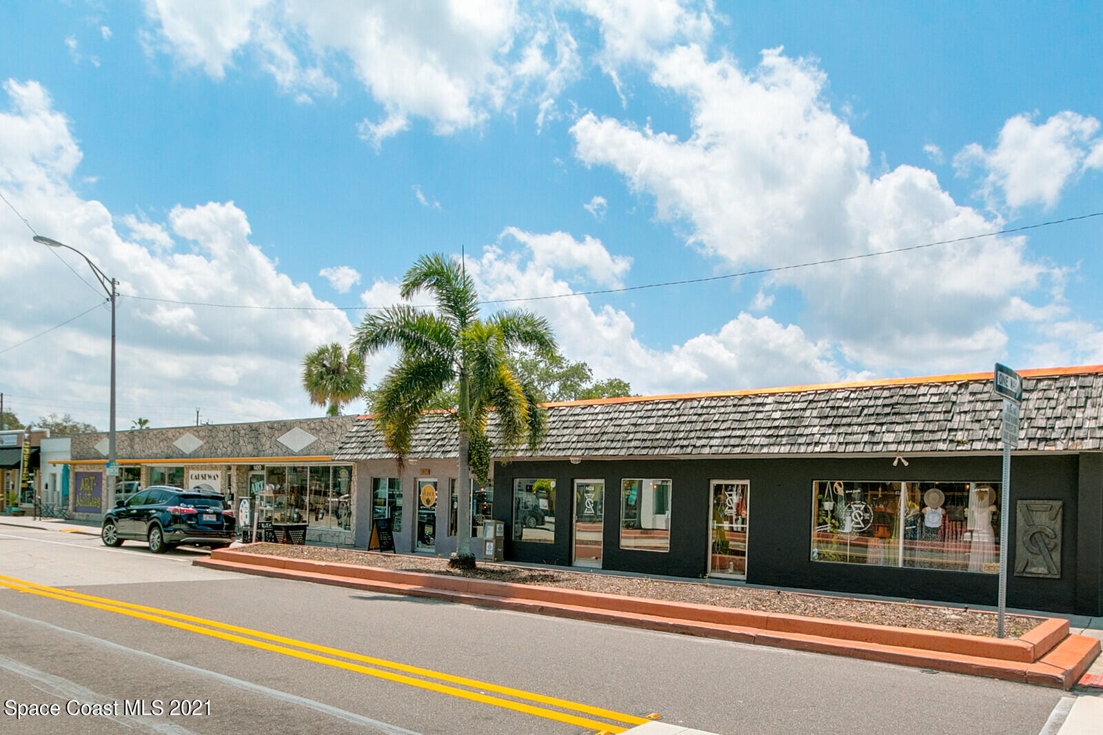 865 Osage Avenue Melbourne, FL 32935 - Photo 27 of 38 a view of a building with a street