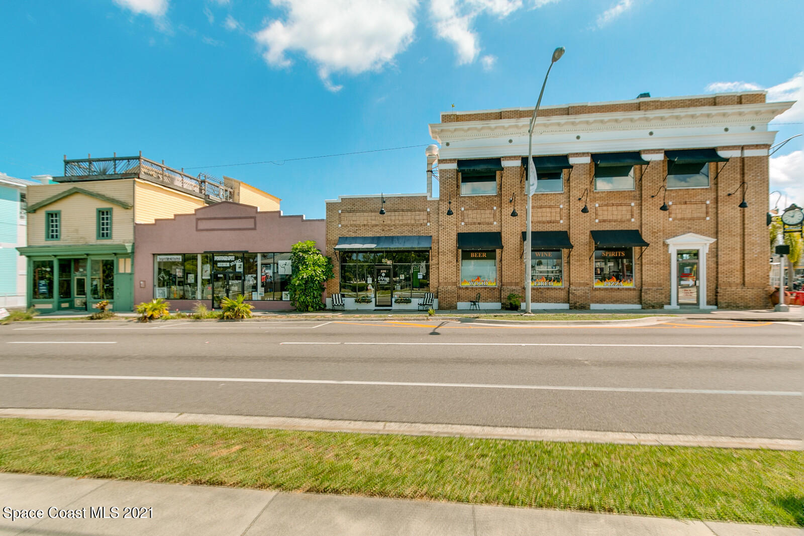 865 Osage Avenue Melbourne, FL 32935 - Photo 37 of 38 a view of a building with a street