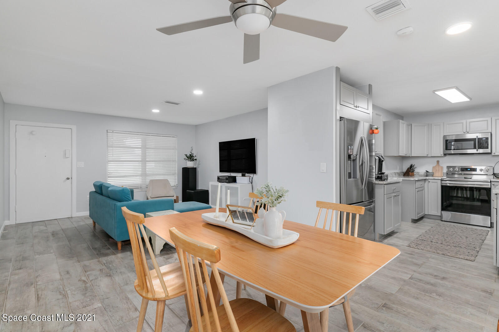 865 Osage Avenue Melbourne, FL 32935 - Photo 8 of 38 a view of a dining room with furniture