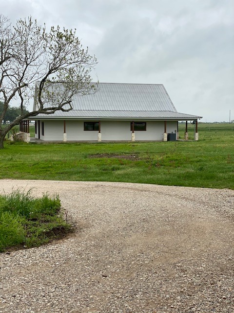 36100 Fm 1488 Hempstead, TX 77445 - Photo 10 of 10 a front view of a house with a yard