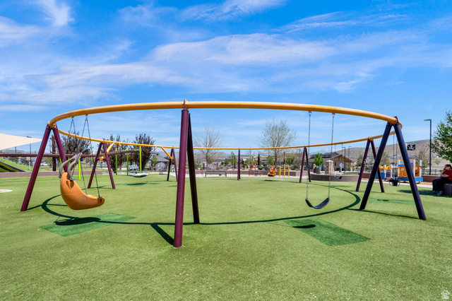 6120 North Sheps Ridge Road Eagle Mountain, UT 84005 - Photo 36 of 43 Community playground featuring multiple swing sets