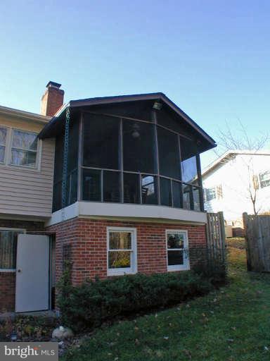 13105 Clifton Road Silver Spring, MD 20904 - Photo 25 of 30 View of screened porch from rear