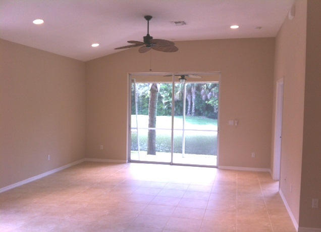 144 Coconut Key Lane Delray Beach, FL 33484 - Photo 5 of 16 an empty room with a empty space and windows