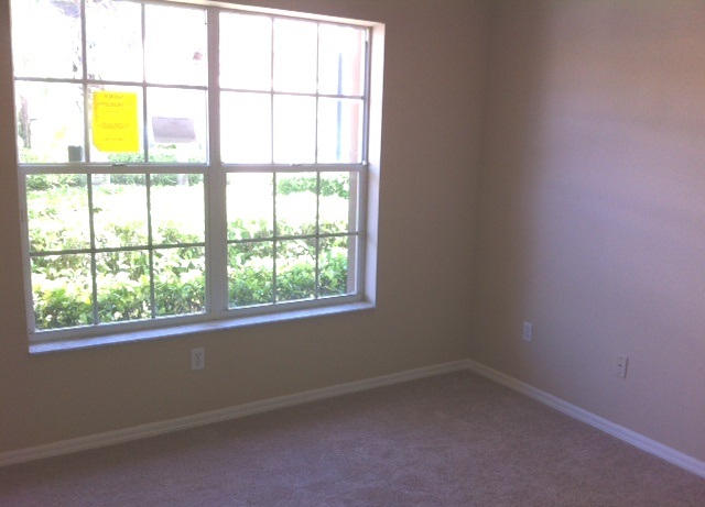 144 Coconut Key Lane Delray Beach, FL 33484 - Photo 9 of 16 an empty room with a window