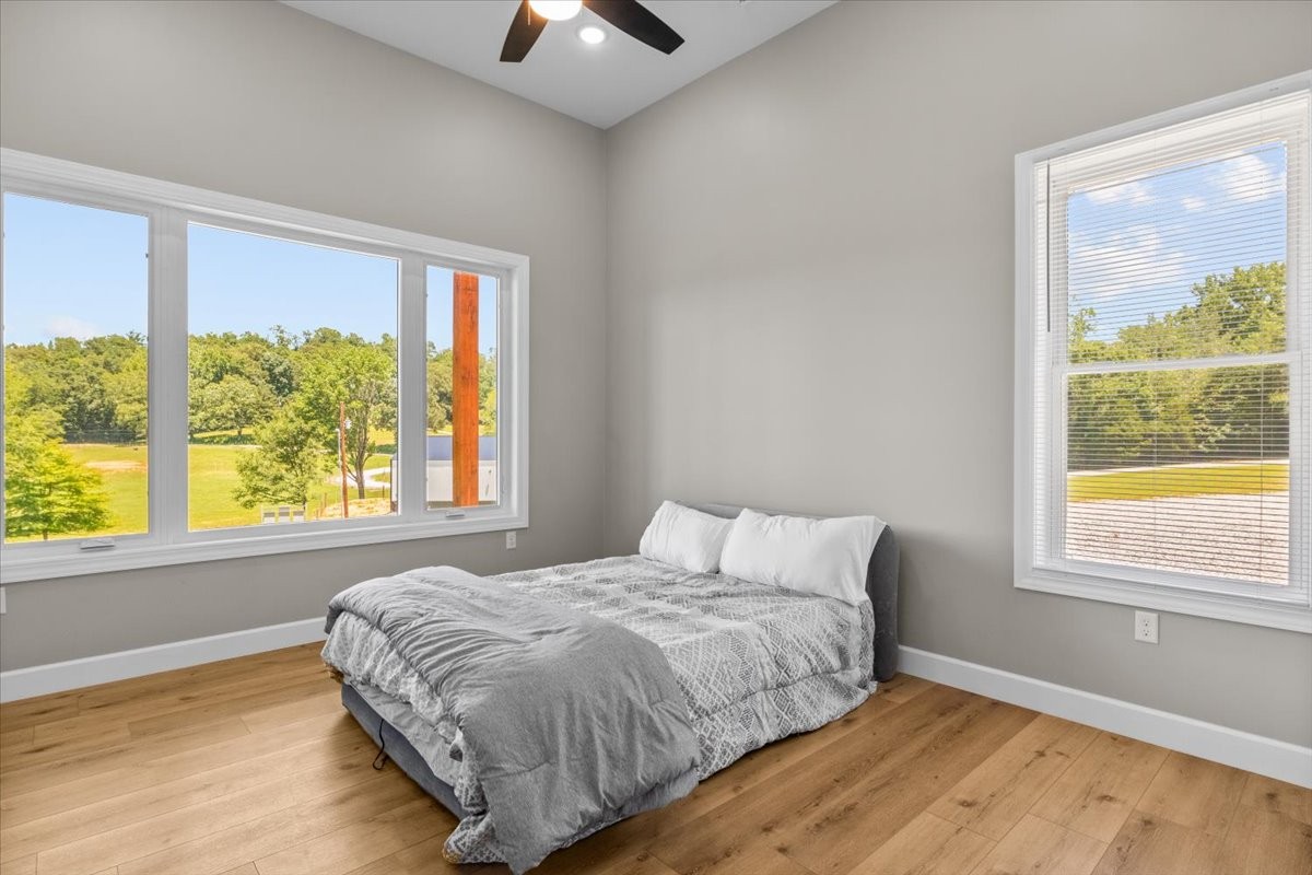 1489 Utley Road Camden, TN 38320 - Photo 28 of 60 a bedroom with a bed and a window