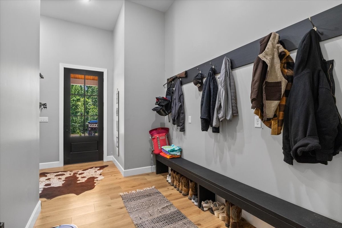 1489 Utley Road Camden, TN 38320 - Photo 33 of 60 a view of walk in closet with clothes and shoes
