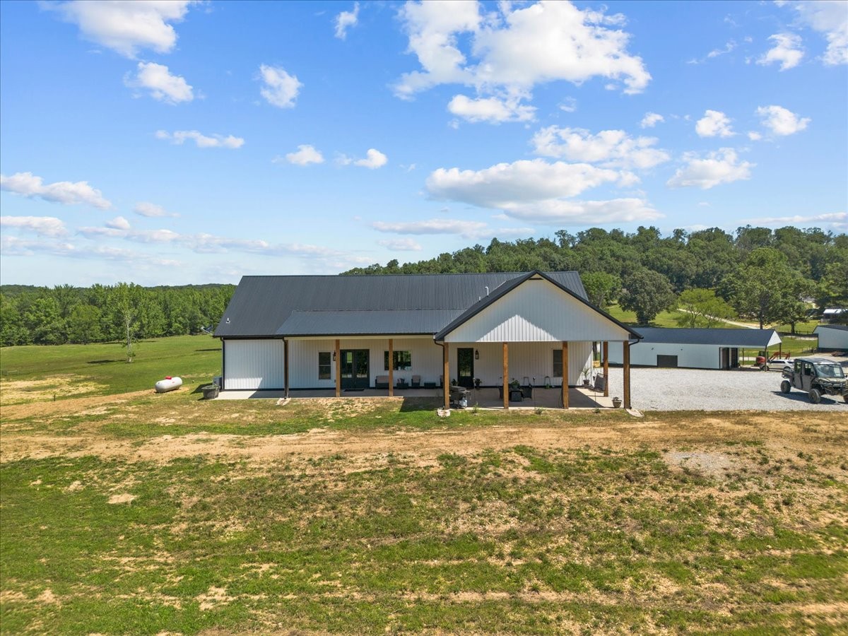 1489 Utley Road Camden, TN 38320 - Photo 36 of 60 a view of a house with a big yard