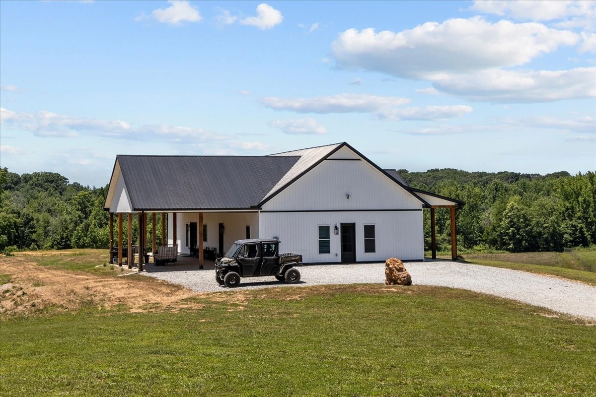1489 Utley Road Camden, TN 38320 - Photo 37 of 60 a front view of house with yard