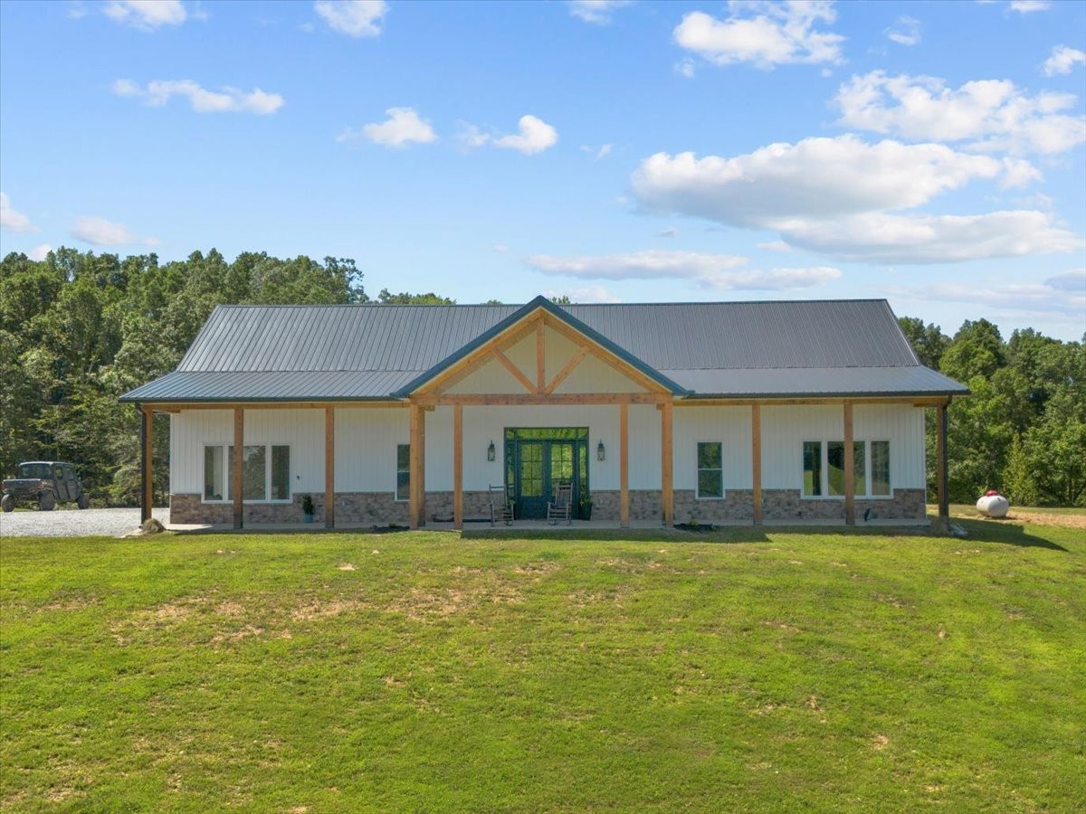 1489 Utley Road Camden, TN 38320 - Photo 39 of 60 a front view of house with yard and green space