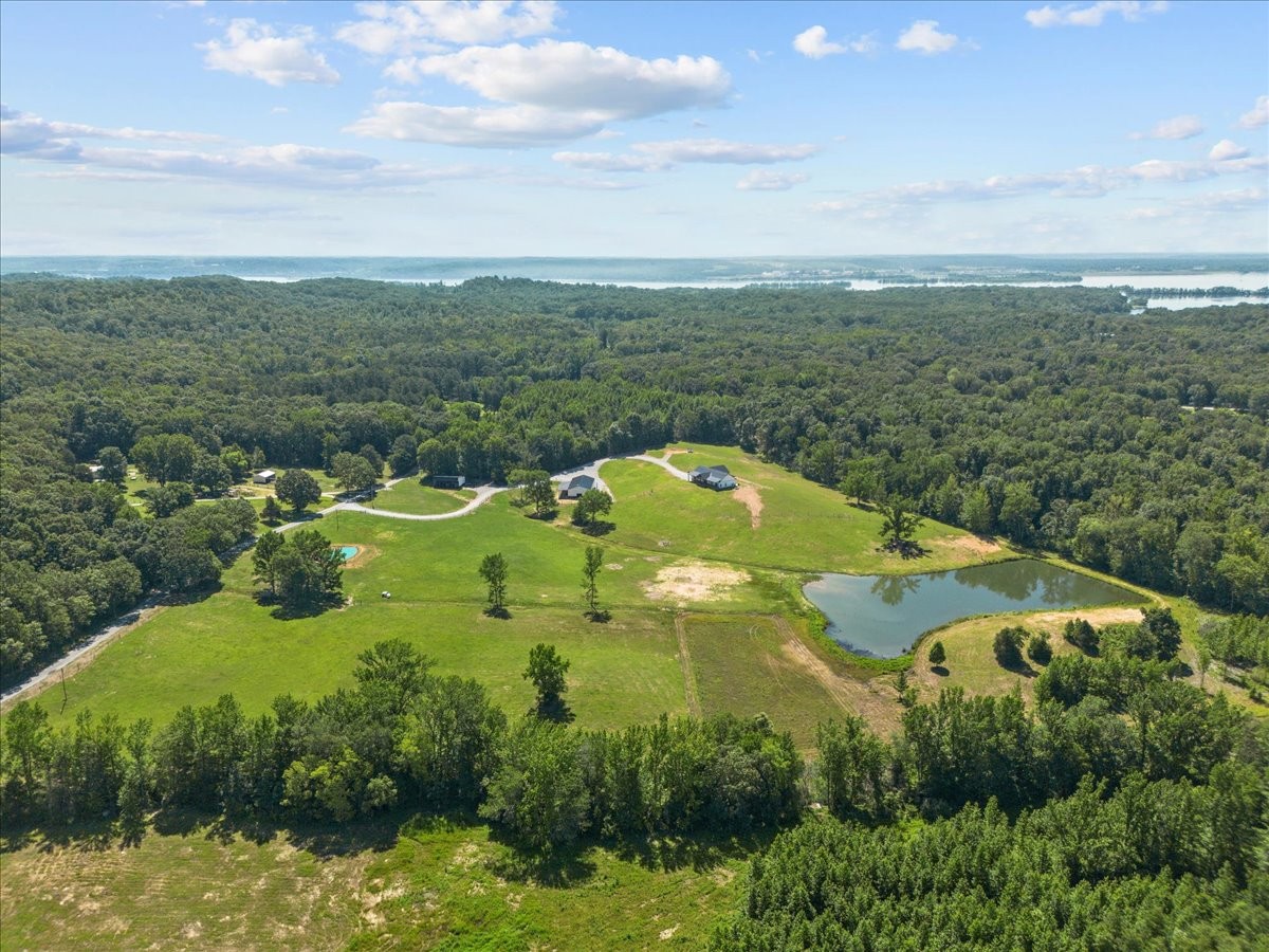 1489 Utley Road Camden, TN 38320 - Photo 60 of 60 an aerial view of a house with yard and green space