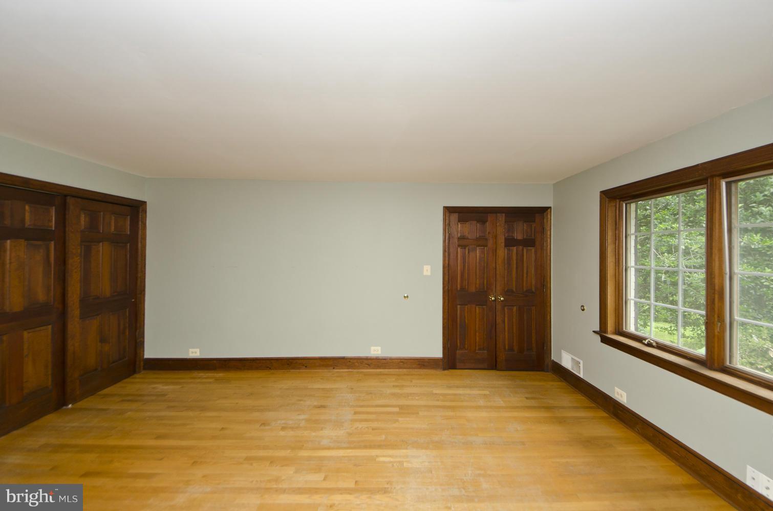 7120 Georgetown Pike McLean, VA 22101 - Photo 13 of 30 a view of an empty room with a window