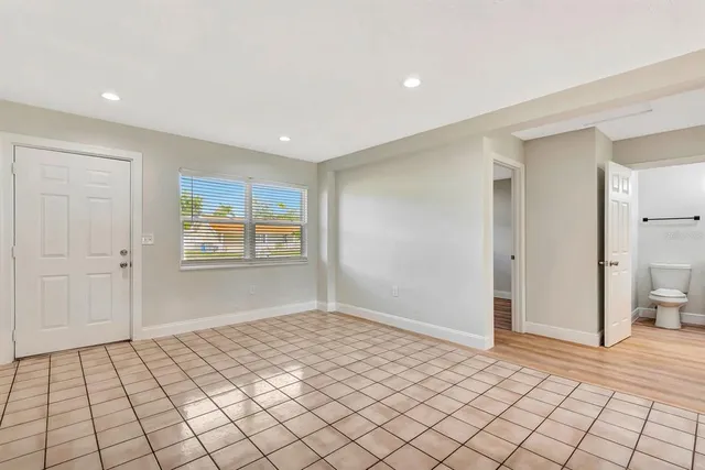 a view of an empty room and window