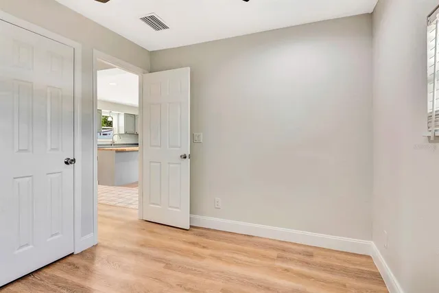 a view of an empty room and window