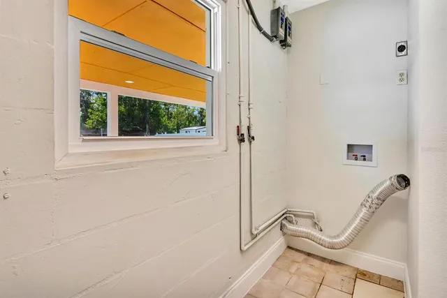 a bathroom with a tub and shower