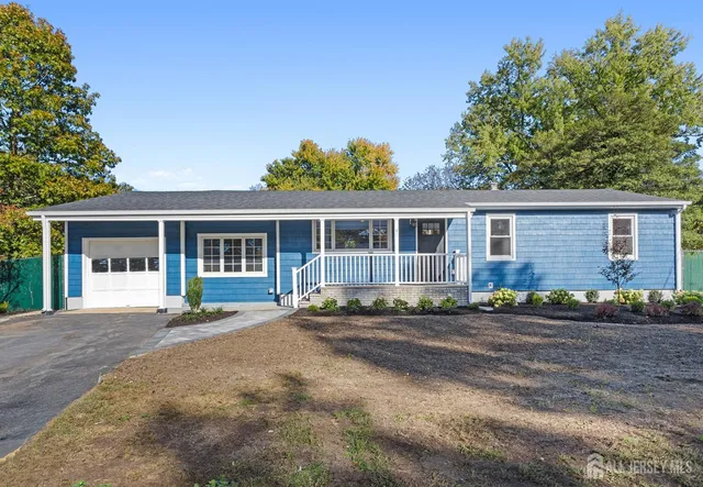 front view of a house with a patio