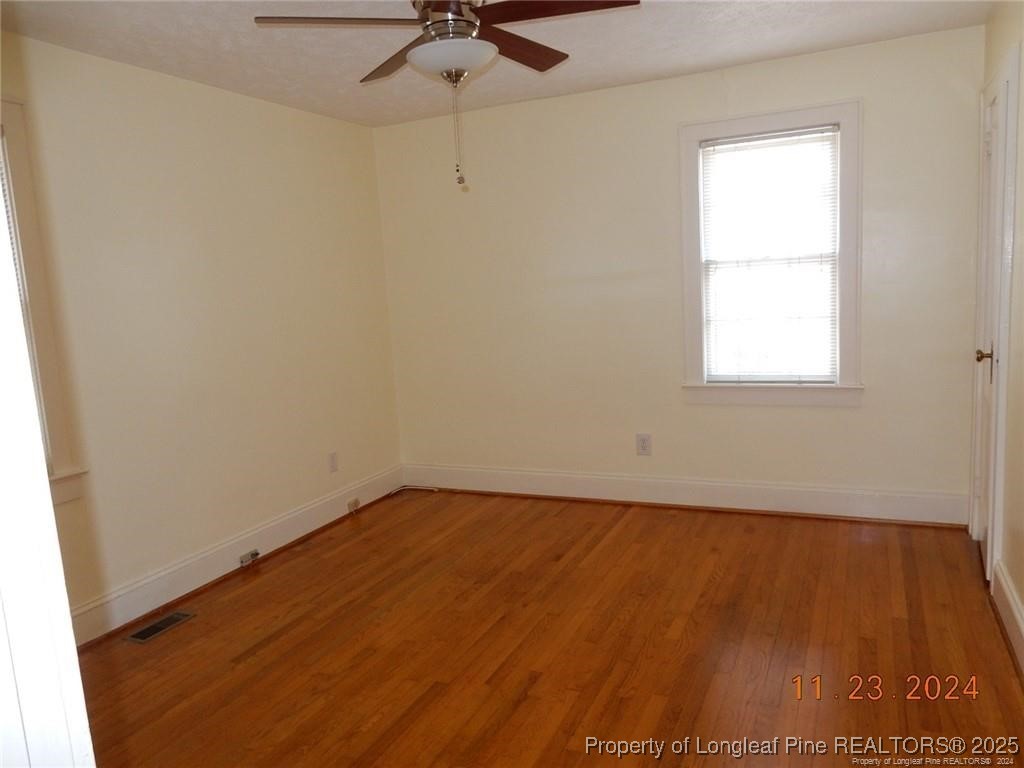 708 Rush Road Fayetteville, NC 28305 - Photo 13 of 17 an empty room with a window