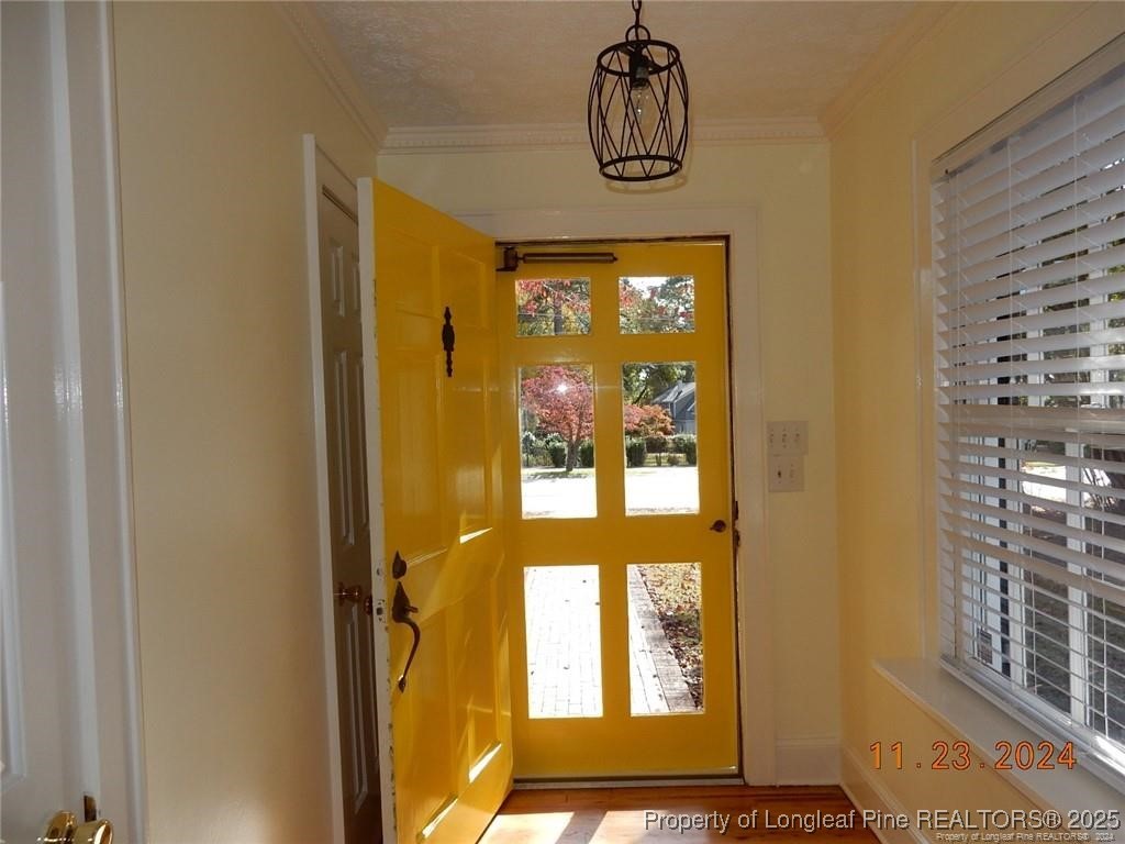 708 Rush Road Fayetteville, NC 28305 - Photo 5 of 17 a view of a entryway door with wooden floor