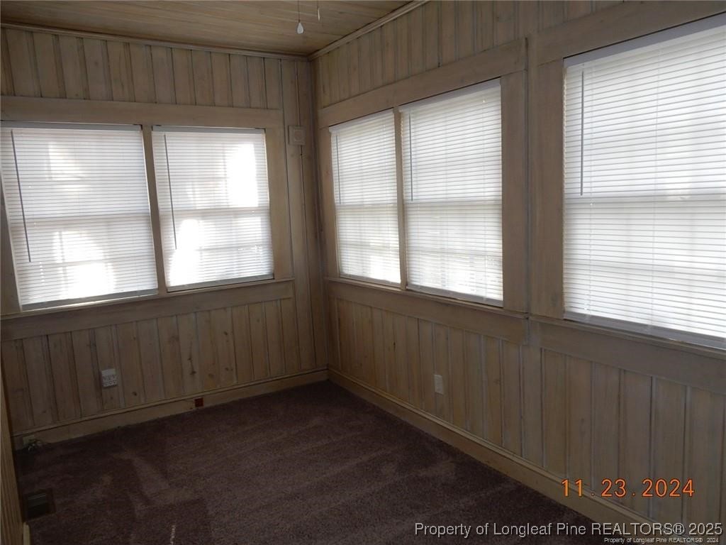 708 Rush Road Fayetteville, NC 28305 - Photo 7 of 17 a view of an empty room with a window