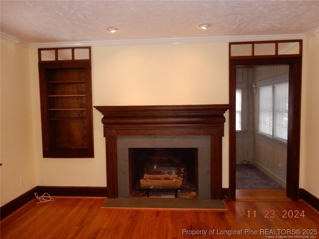 708 Rush Road Fayetteville, NC 28305 - Photo 8 of 17 a living room with a fireplace