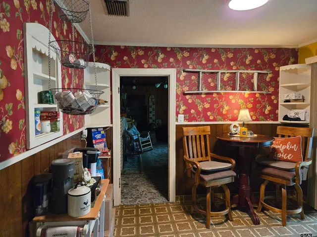 a view of a chairs and tables in patio