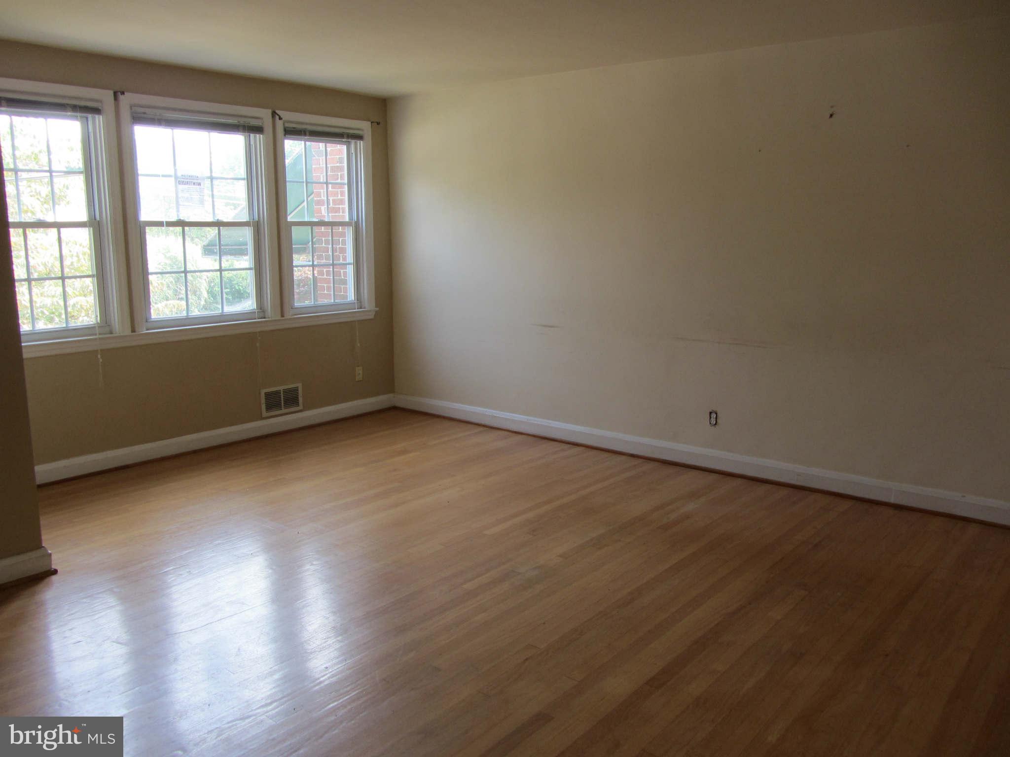 508 Academy Road Baltimore, MD 21228 - Photo 3 of 11 Living Room with Hardwood Flooring