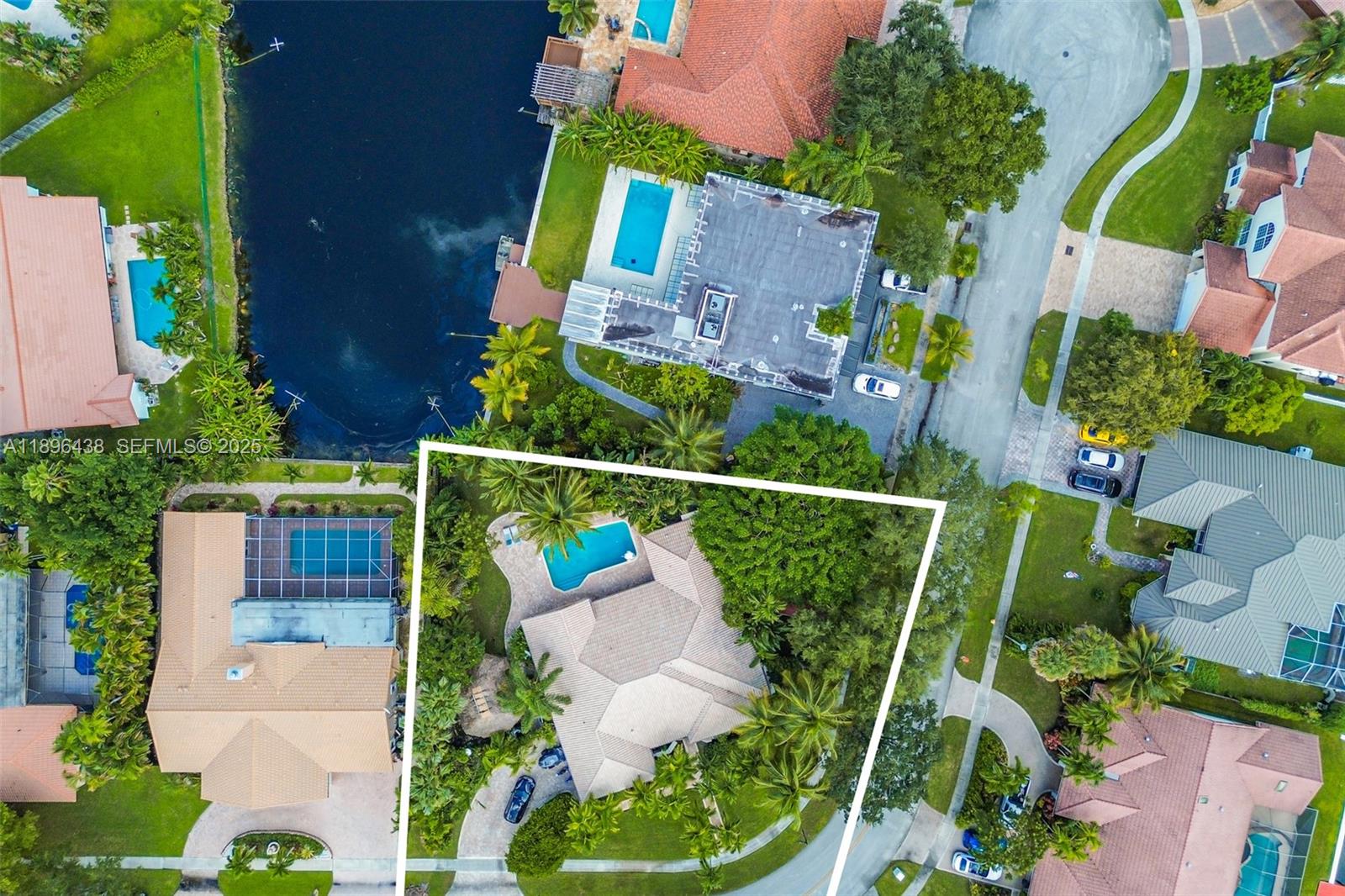 10101 Southwest 5th Street Plantation, FL 33324 - Photo 1 of 77 an aerial view of a house with a garden and plants