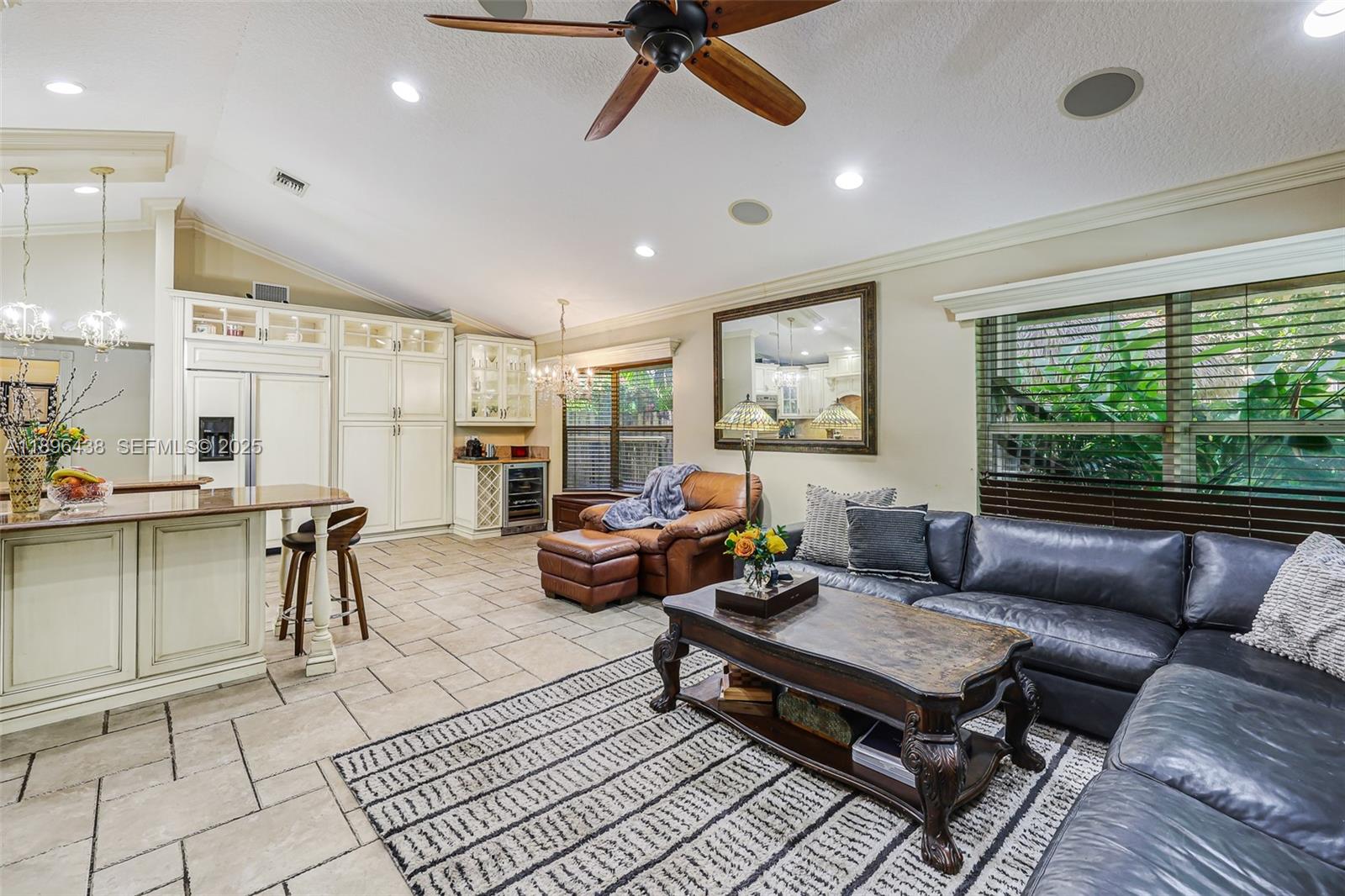 10101 Southwest 5th Street Plantation, FL 33324 - Photo 25 of 77 a living room with furniture a rug and a large window