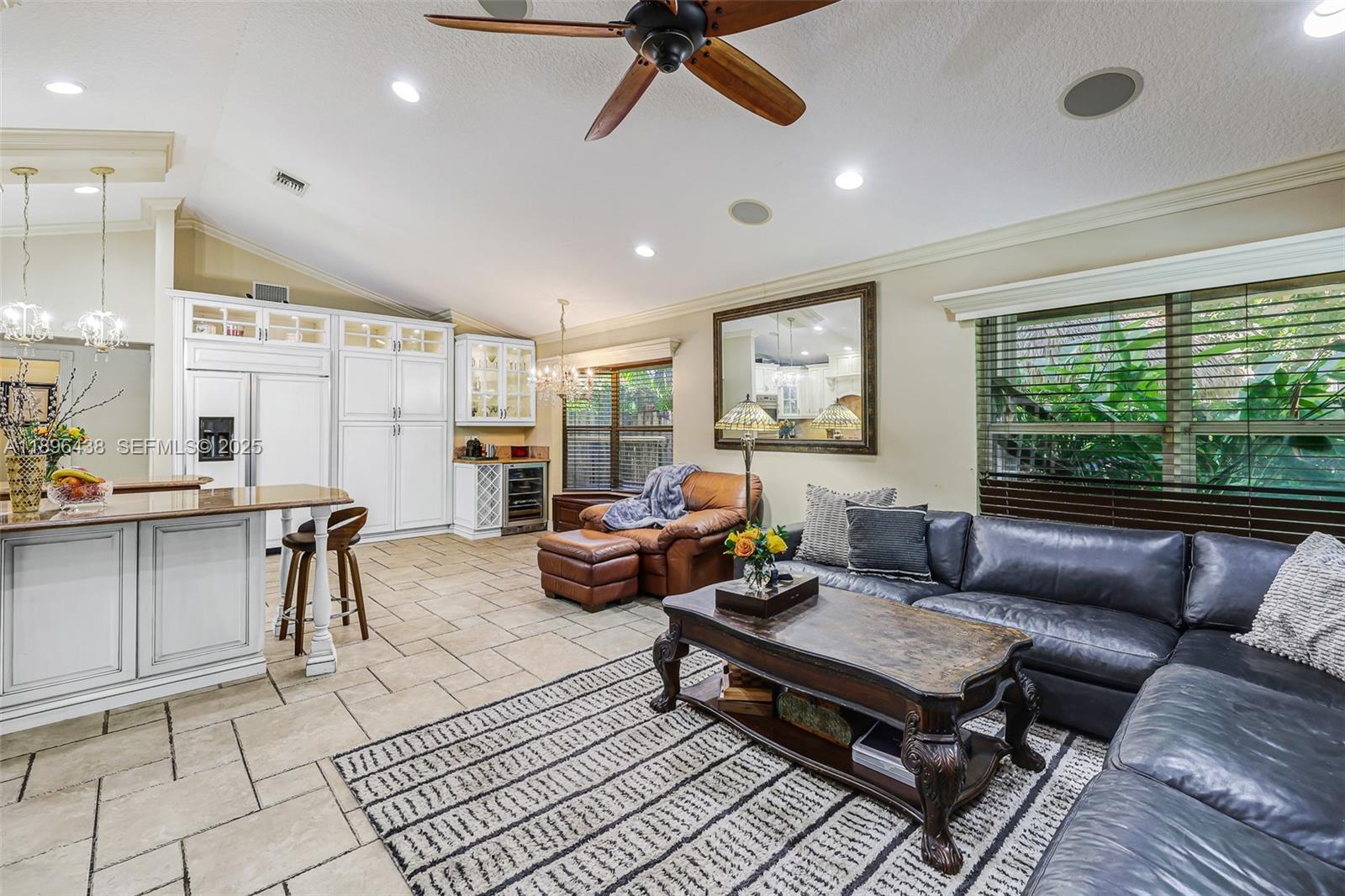 10101 Southwest 5th Street Plantation, FL 33324 - Photo 26 of 77 a living room with furniture a rug and a large window