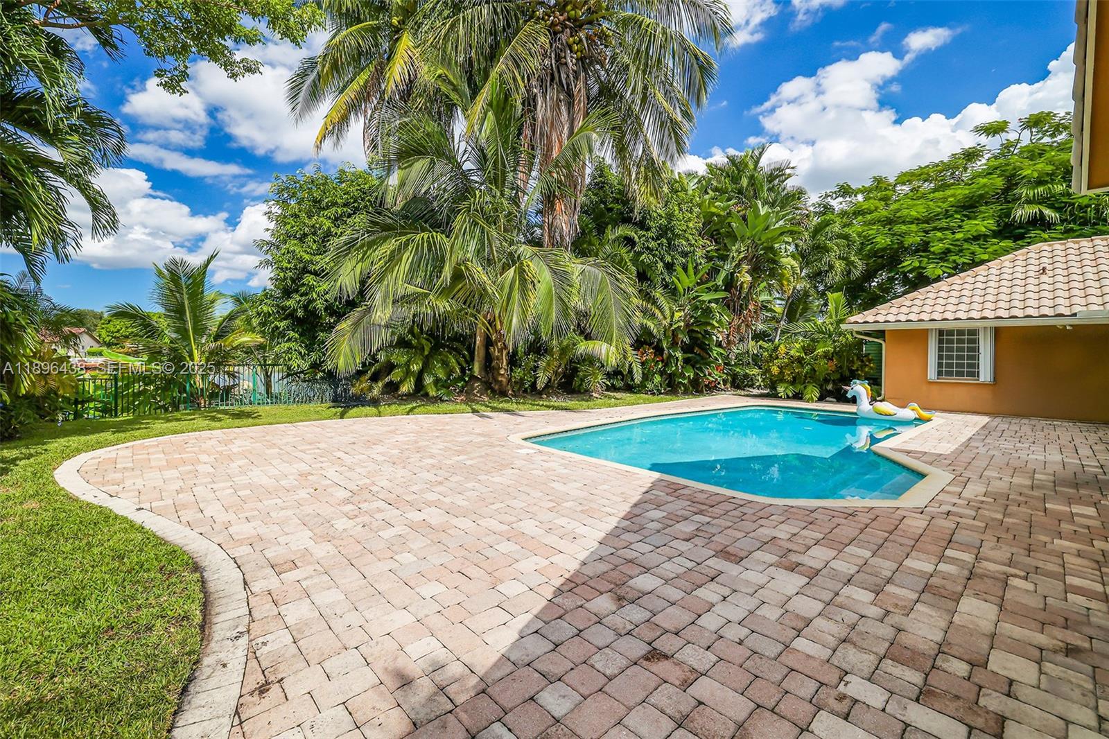 10101 Southwest 5th Street Plantation, FL 33324 - Photo 49 of 77 a view of outdoor space yard and swimming pool