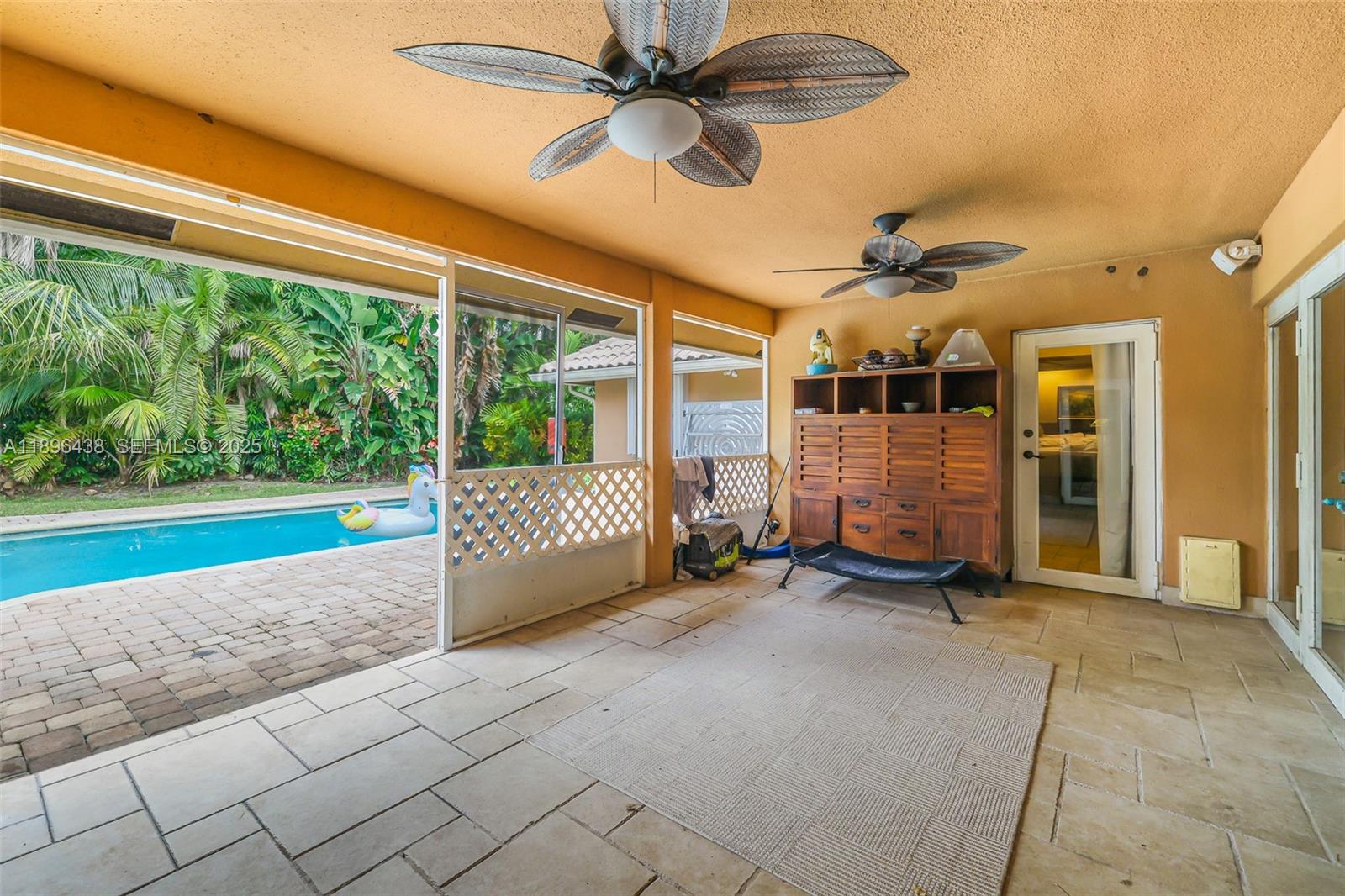 10101 Southwest 5th Street Plantation, FL 33324 - Photo 54 of 77 a view of a porch with furniture and a yard
