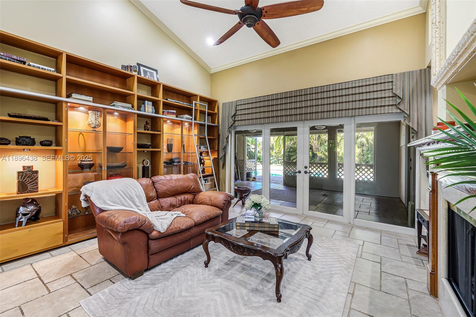 10101 Southwest 5th Street Plantation, FL 33324 - Photo 10 of 77 a living room with furniture and a fireplace
