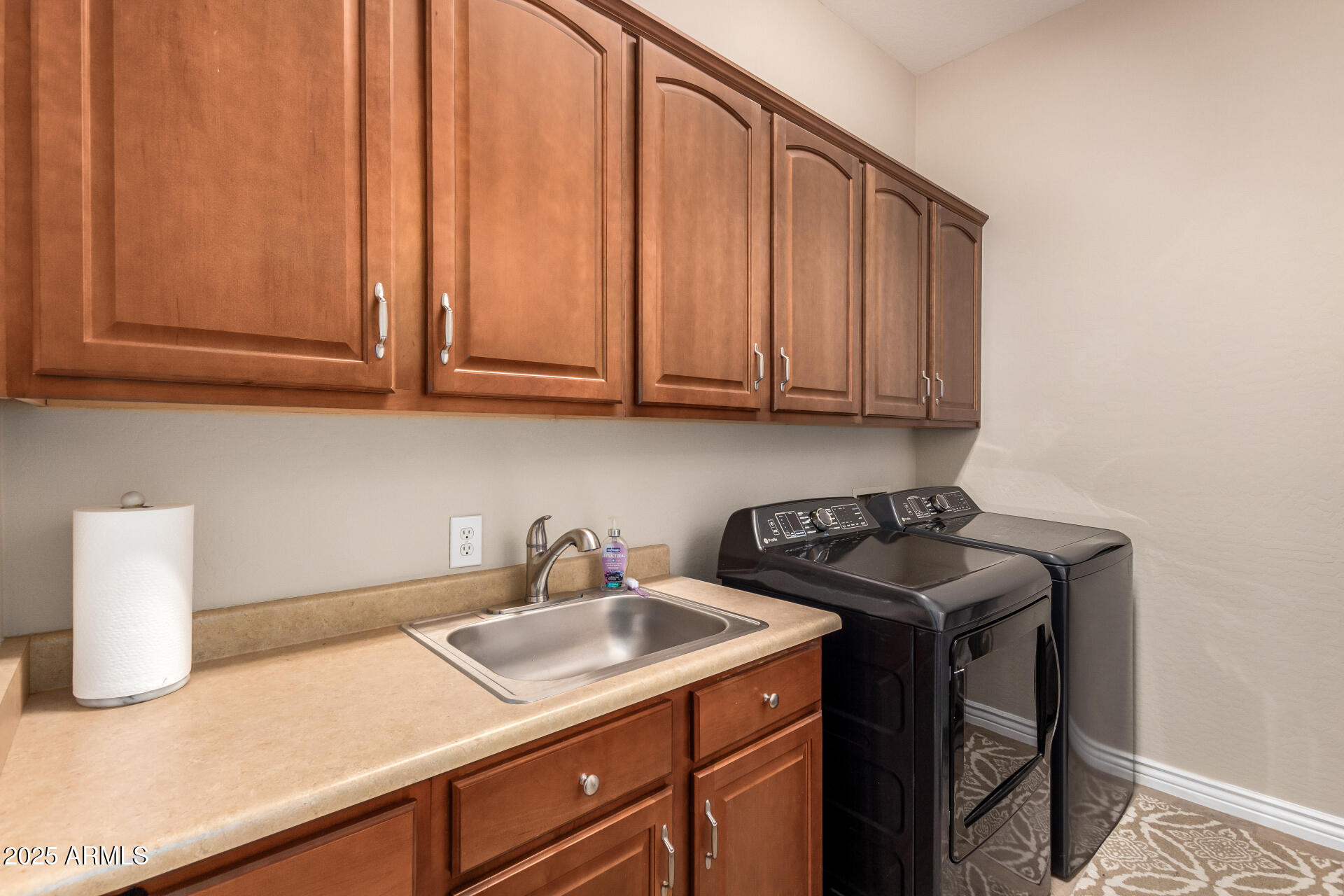 41715 North River Bend Road Phoenix, AZ 85086 - Photo 13 of 60 a kitchen with a sink cabinets and appliances