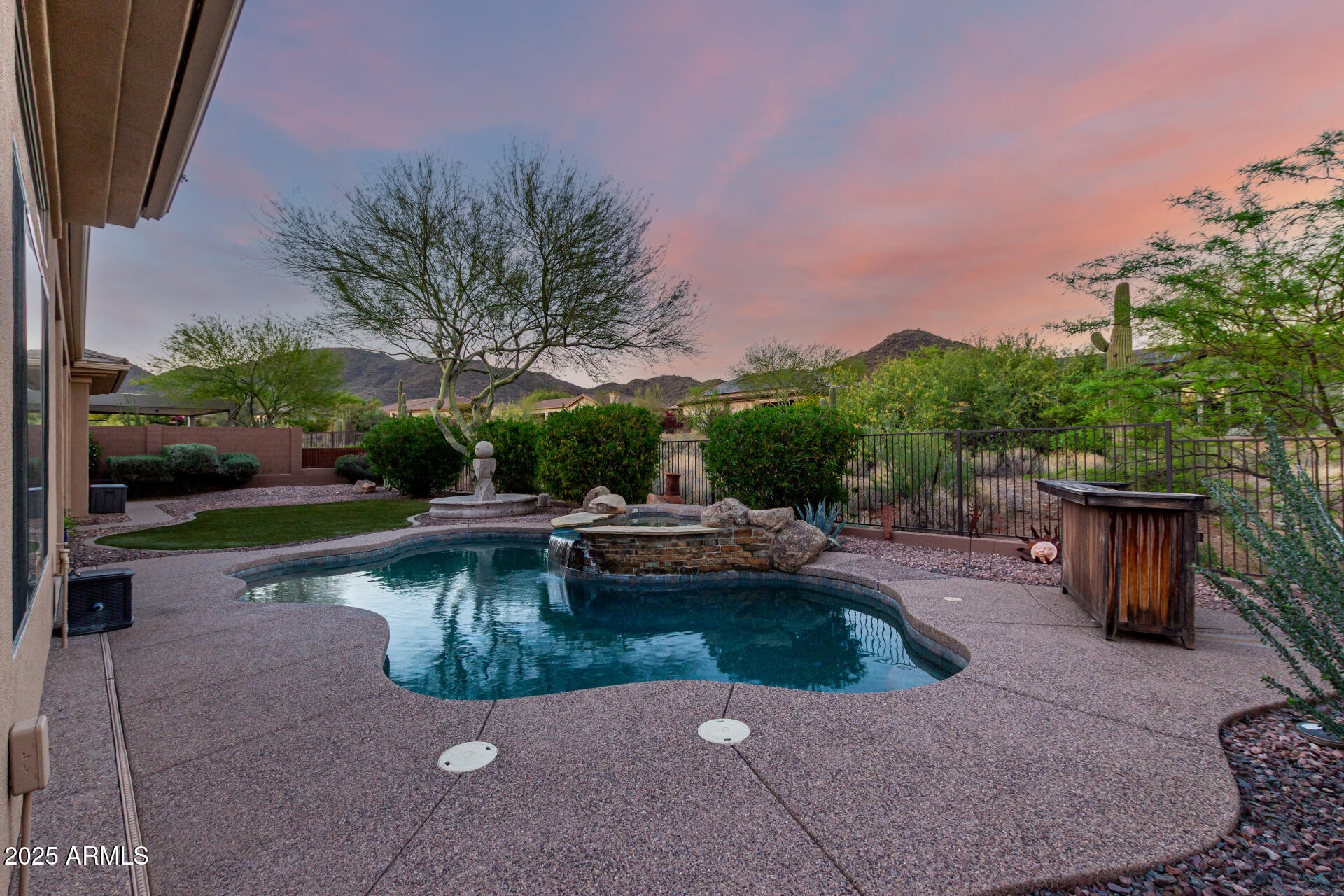 41715 North River Bend Road Phoenix, AZ 85086 - Photo 14 of 60 a view of swimming pool with outdoor seating and plants