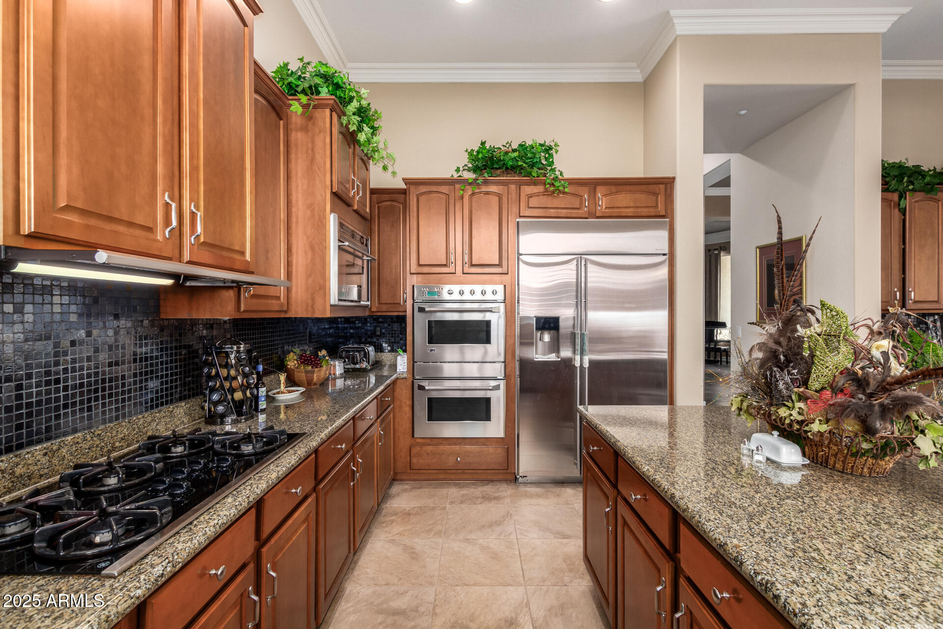 41715 North River Bend Road Phoenix, AZ 85086 - Photo 21 of 60 a kitchen with stainless steel appliances granite countertop a refrigerator and a stove