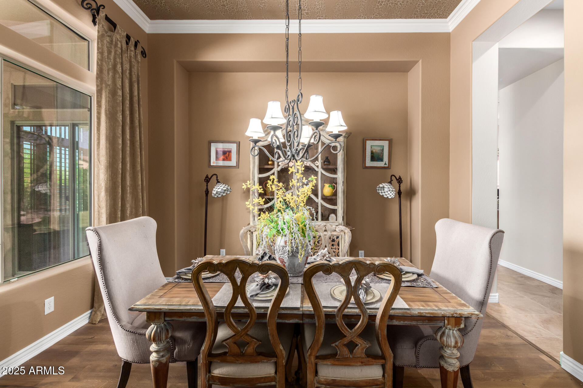 41715 North River Bend Road Phoenix, AZ 85086 - Photo 24 of 60 a view of a dining room with furniture and chandelier