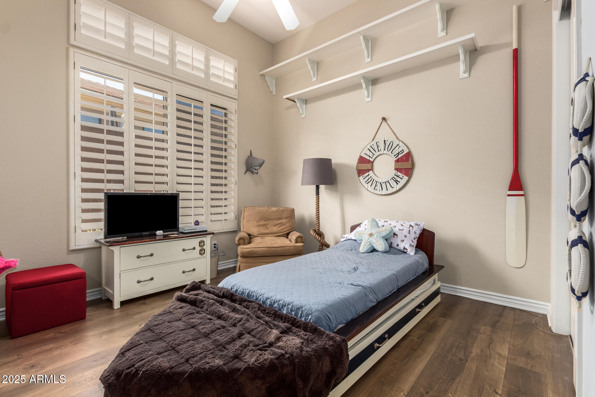 41715 North River Bend Road Phoenix, AZ 85086 - Photo 35 of 60 a bedroom with a bed and a flat screen tv