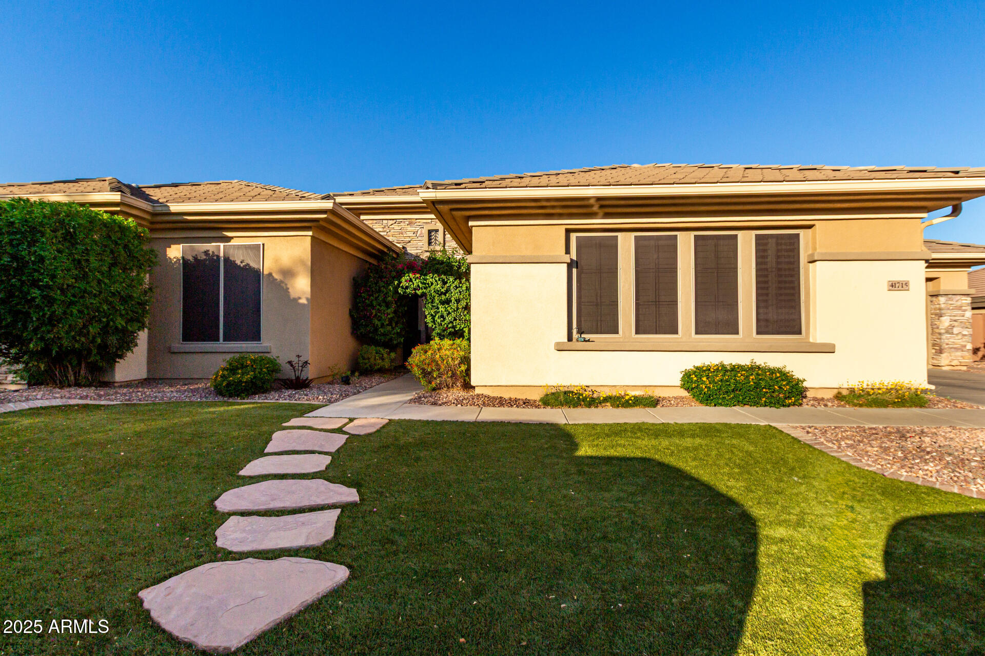 41715 North River Bend Road Phoenix, AZ 85086 - Photo 40 of 60 a view of a house with a swimming pool