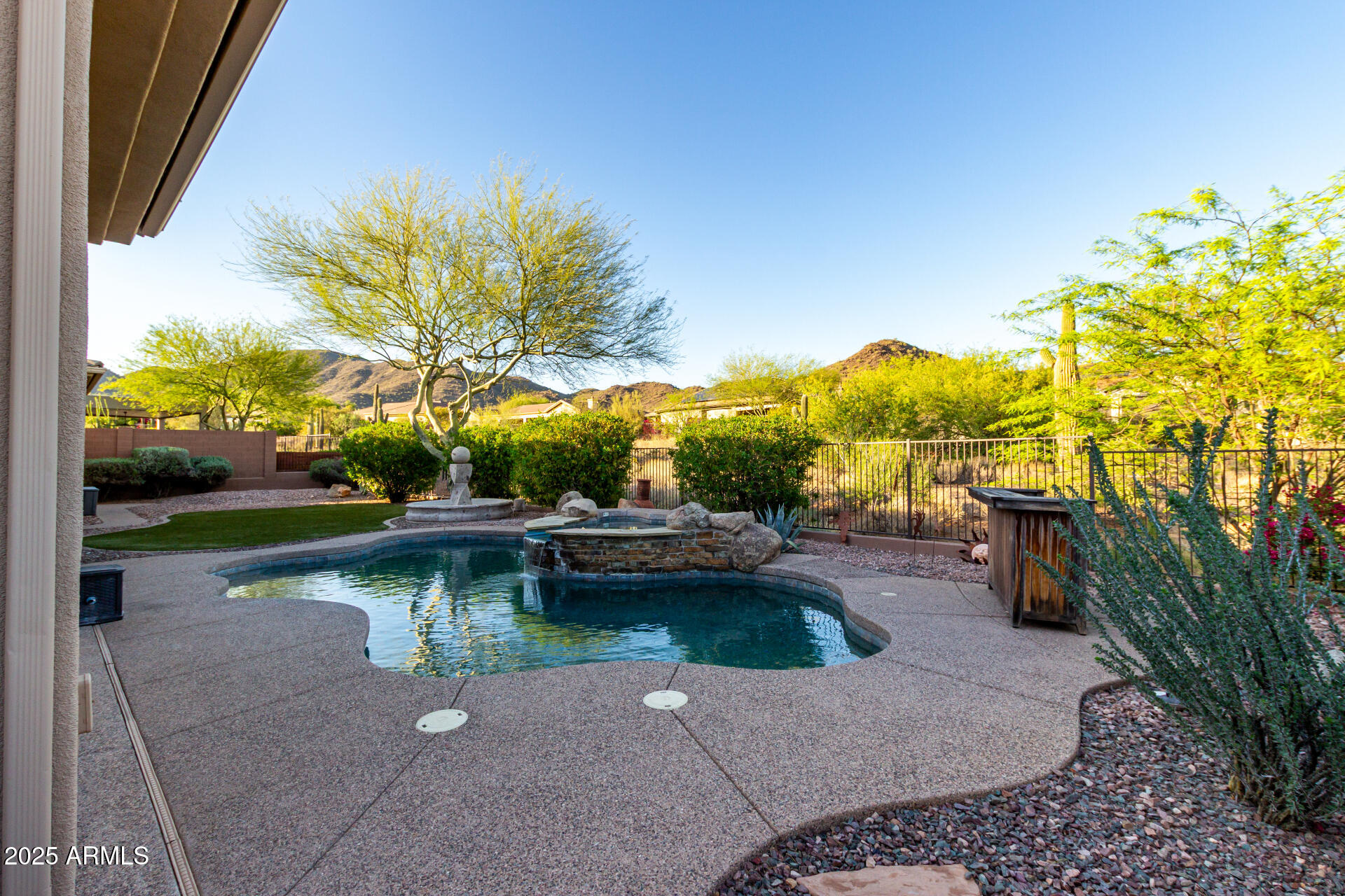 41715 North River Bend Road Phoenix, AZ 85086 - Photo 49 of 60 a view of a backyard with swimming pool