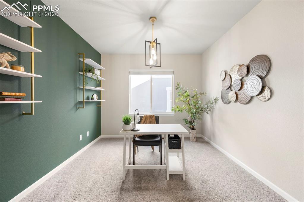 1073 Native Dancer Terrace Colorado Springs, CO 80921 - Photo 28 of 48 Office featuring baseboards and light carpet