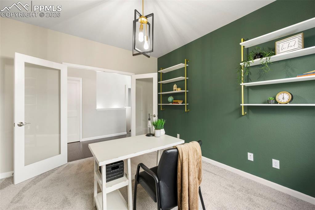 1073 Native Dancer Terrace Colorado Springs, CO 80921 - Photo 29 of 48 Office with light colored carpet and baseboards