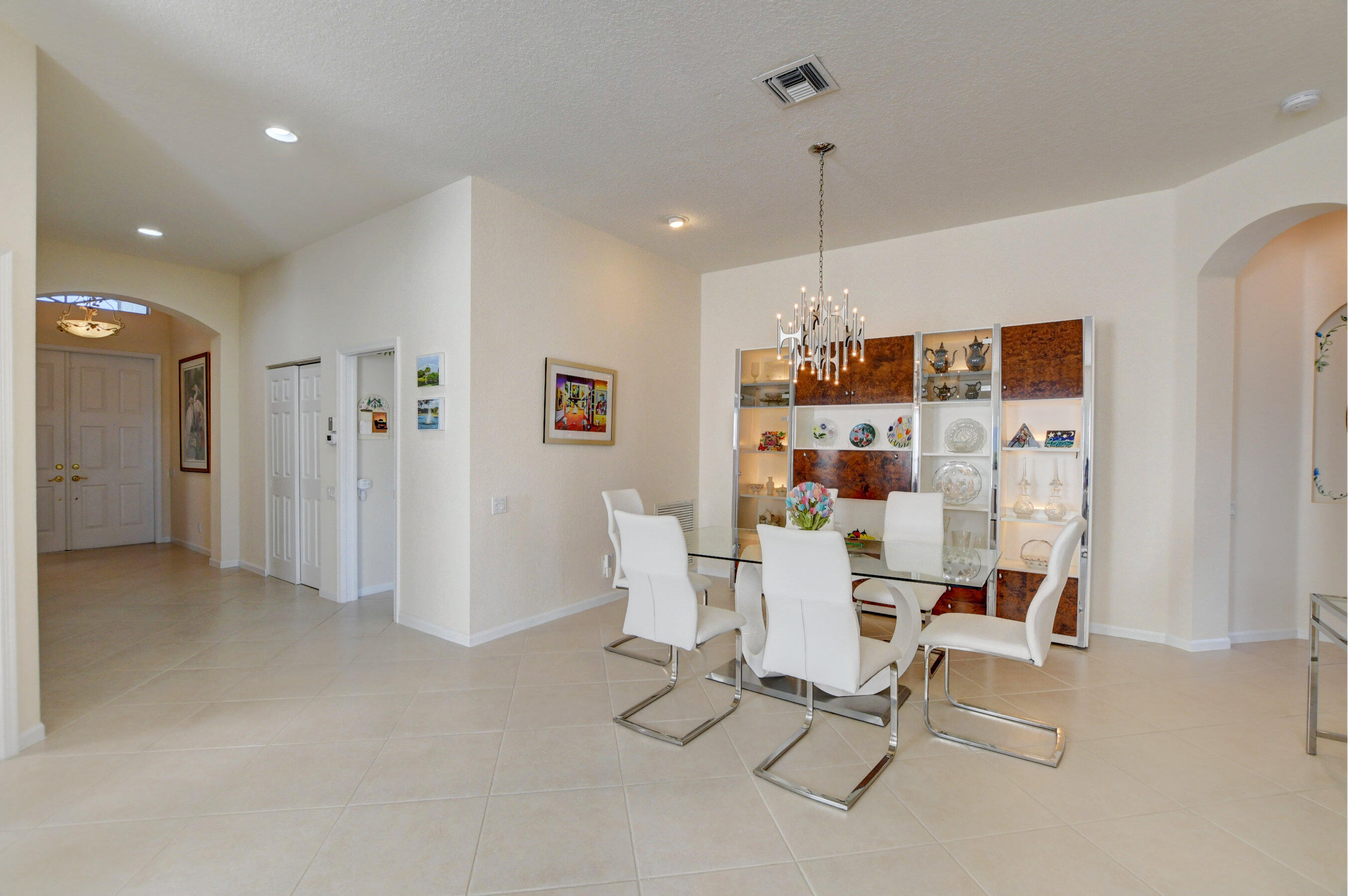 7097 Haviland Circle Boynton Beach, FL 33437 - Photo 28 of 72 a view of a dining room with furniture