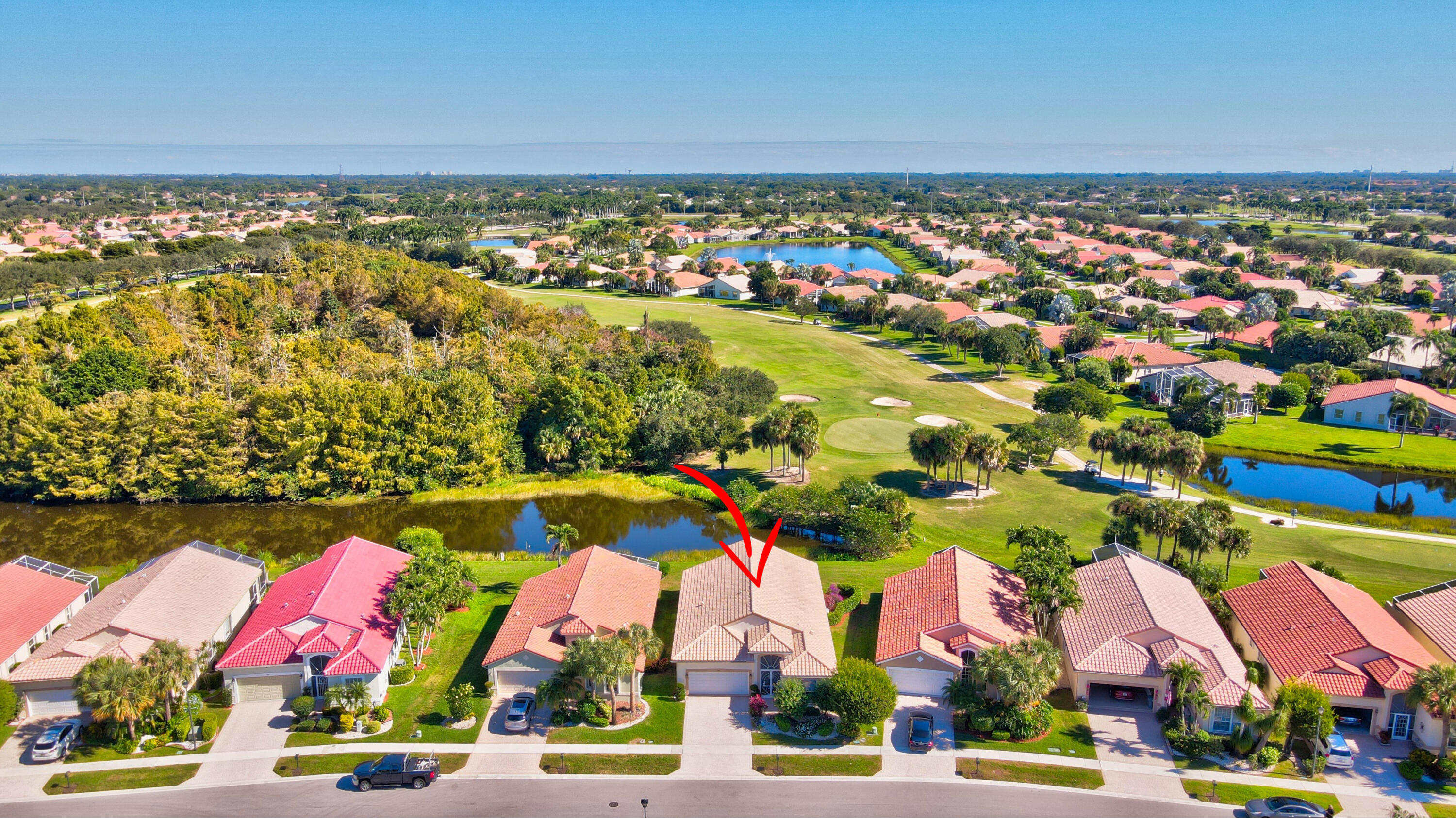 7097 Haviland Circle Boynton Beach, FL 33437 - Photo 47 of 72 an aerial view of residential houses with outdoor space and swimming pool