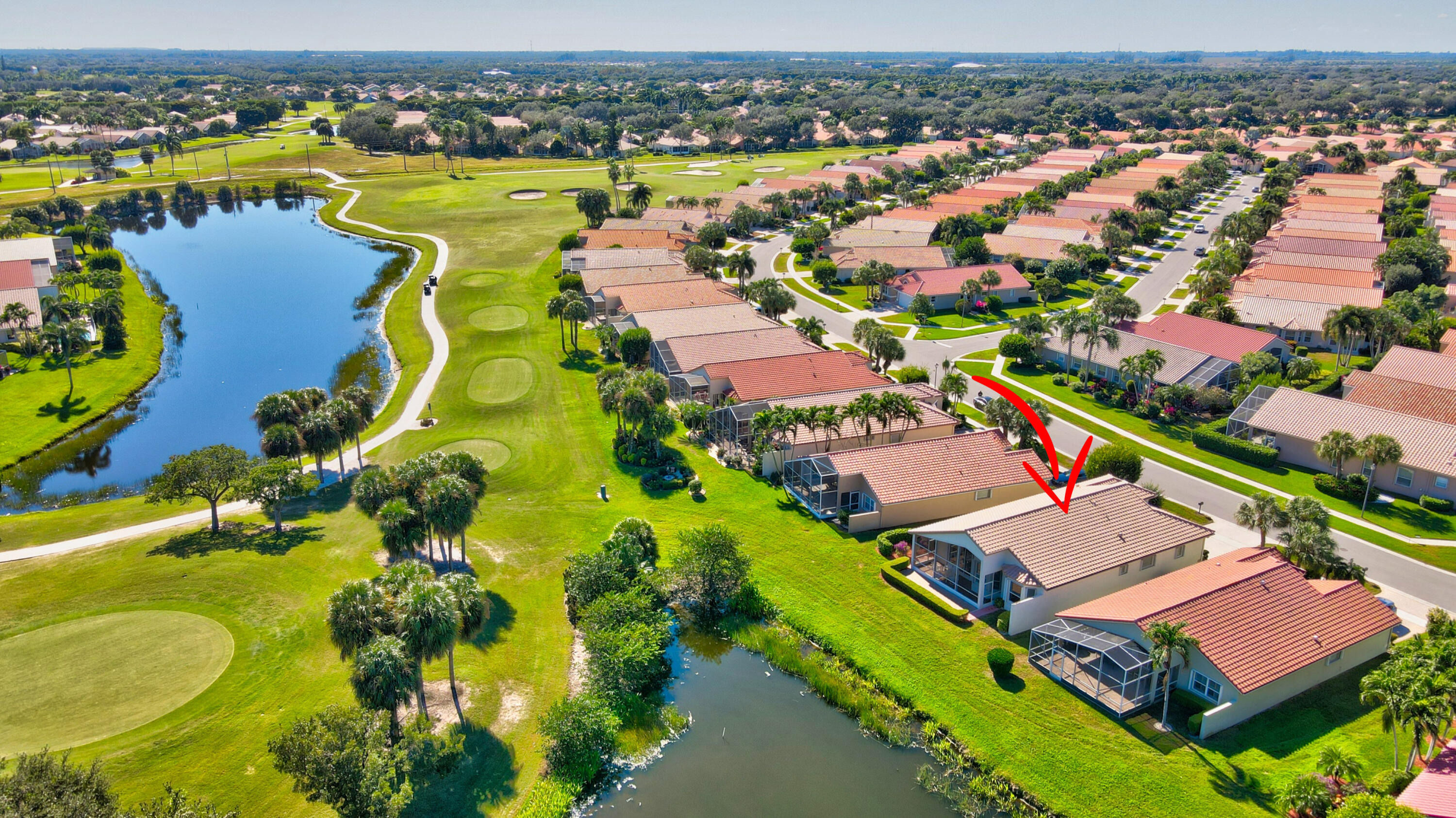 7097 Haviland Circle Boynton Beach, FL 33437 - Photo 51 of 72 an aerial view of a house with a swimming pool yard and outdoor seating